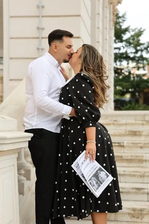 Couple kissing on stone steps